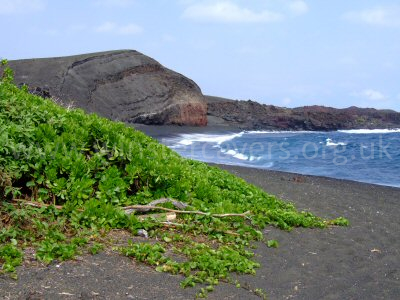 The black sand beach at the end of the 'Road to the Sea'