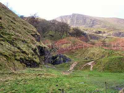 The entrance ravine to Odin Mine. The approach path goes over the bracken-covered hillocks on the right of the cleft.